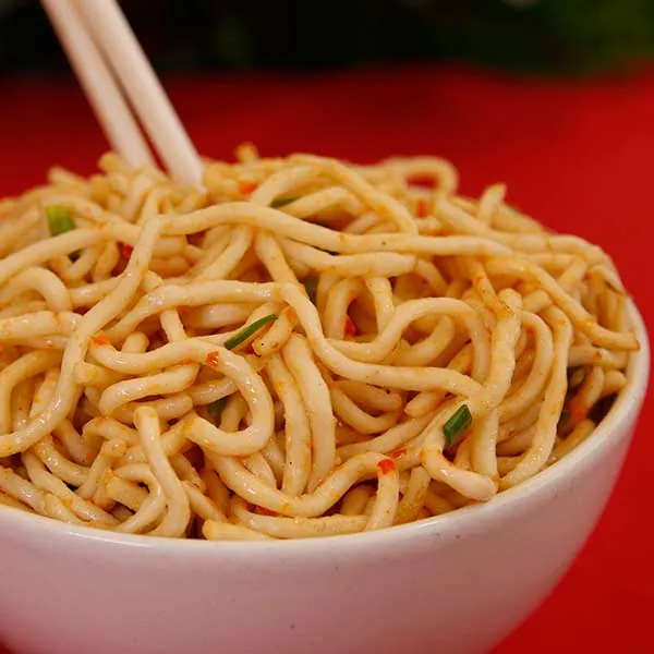 Chilli Garlic Noodles - stir-fried noodles with aromatic garlic, dry chilli, and fresh herbs