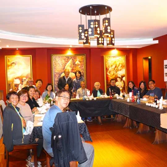 Mister Wok Parklands private dining room — set for group dining with stone feature wall